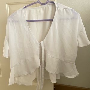 white flowy blouse with two front ties